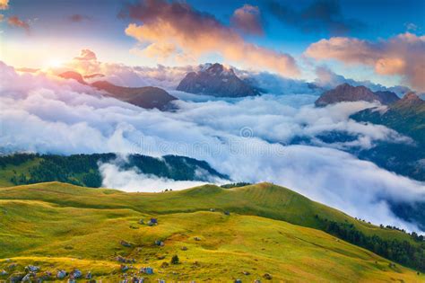 Beautiful Foggy Sunrise In The Italian Alps Dolomites South Ty Stock