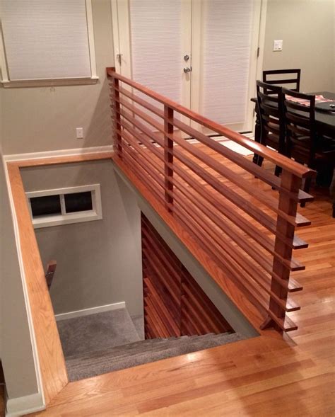 Enlarged Stair Case With Handmade Railings And Removable Partition Wall