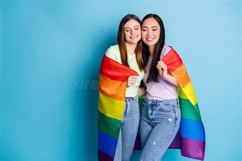 photo of cute pretty lesbians couple ladies parade tolerance same sex marriages hugging gay
