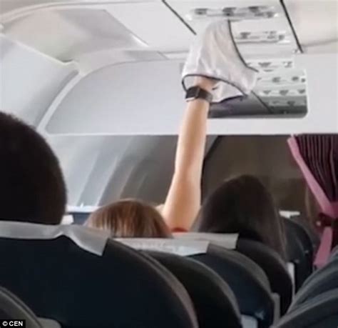 Female Passenger Shocks Everyone After Bringing Out Her Wet Panties To Dry Inside Plane Photo
