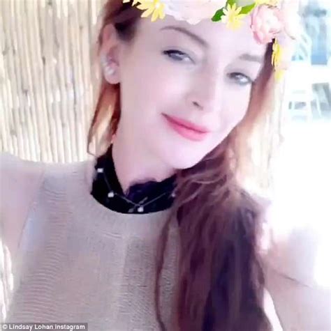Lindsay Lohan Shows Off Figure In A Nude Dress And Sexy Swimwear