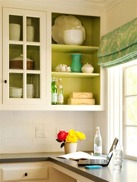 I painted the inside of our open shelving white to help it stand out against our olive green cabinets. 7 Cheap Ways to Update Your Kitchen Cabinets - Better HouseKeeper