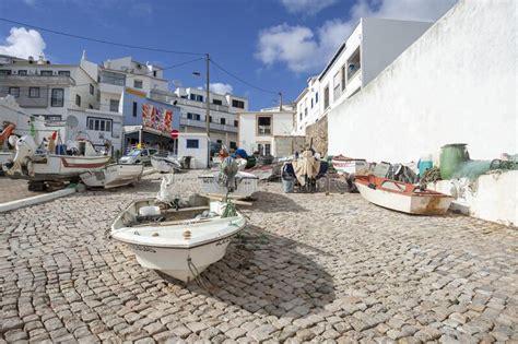 Fishing Boats In The Village Centre Of Burgau In The Algarve Editorial