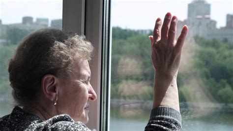 Old Sad Woman Looking Out Window Concept Of Stock Footage Sbv 334628248 Storyblocks