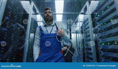 Male Technician Working In A Data Center Stock Photo Image Of Center