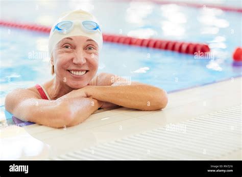 Happy Senior Woman In Swimming Pool Stock Photo Alamy