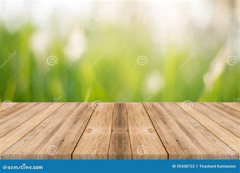 Wooden Board Empty Table In Front Of Blurred Background Perspective