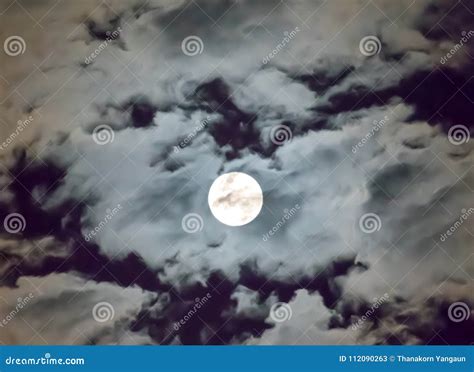 Beautiful Full Moon And White Cloudy Sky Background In The Midnight Sky