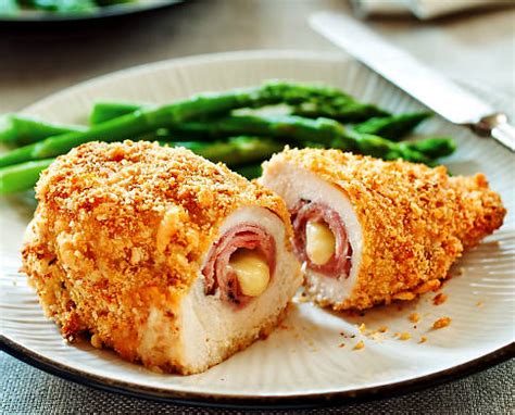 Line a baking sheet with parchment paper. Chicken Cordon Bleu