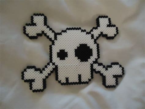 *if you are using the perler mini beads, the closest. Skull and Cross Bones by PerlerHime | Perler bead art ...