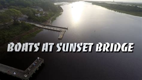 Boats At Sunset Bridge Youtube