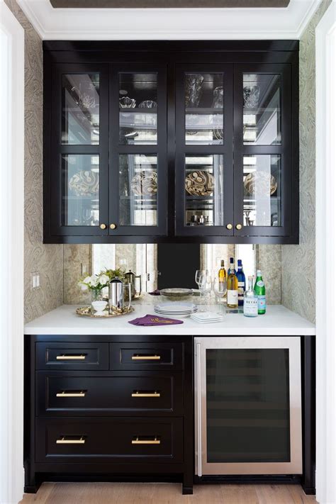 Gorgeous Wet Bar With Antiqued Mirror Black Cabinets And Metallic