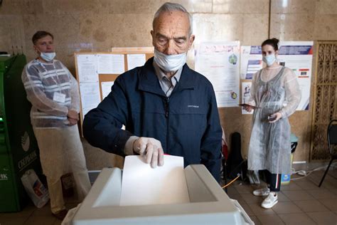 russians overwhelmingly back amendments that will keep putin in power early returns show the