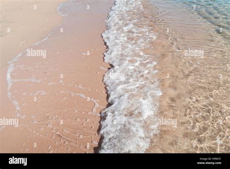 Sea Wave On Sandy Beach Stock Photo Alamy