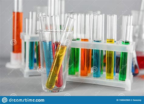 Test Tubes With Colorful Liquids In Beaker On Table Stock Image Image