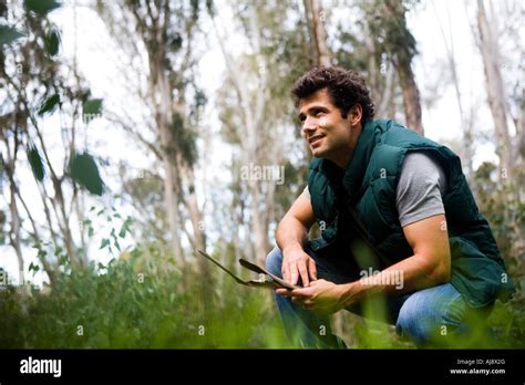 Outdoor Rugged Guy In The Forest Stock Photo Alamy
