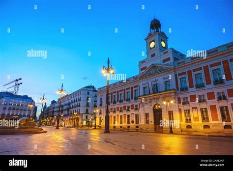 Madrid Spain Night City Skyline At Puerta Del Sol And Clock Tower Of