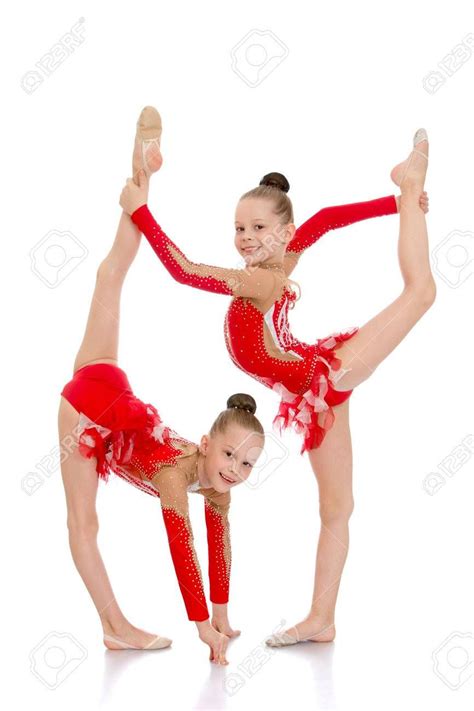 Two Sisters Gymnasts Work Together To Perform Beautiful Gymnastic