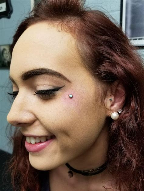 This Beauty Is So Happy To Have Her New Facial Piercing Cheek Dermal
