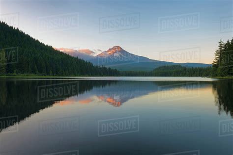 Reflection In Still Mountain Lake Stock Photo Dissolve