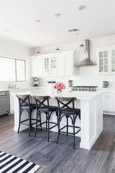 White kitchen cabinetry looks great when fitted with raised panel doors as they give some texture and depth to the design. TOMKAT HOME TOUR 2016 | Home decor, White kitchen decor ...