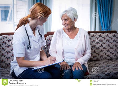 Doctor Consulting With Senior Woman Stock Image Image Of Doctor