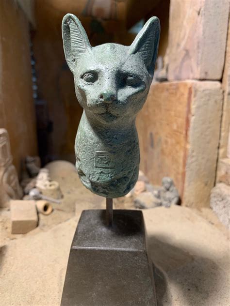egyptian statue fragment cat goddess bast bastet wearing the eye of horus