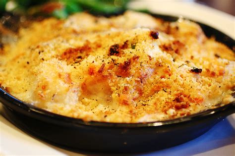 Try this easy seafood casserole made with shrimp, crab, lobster, parmesan cheese, wine, and a seasoned white sauce. Janet's Seafood Casserole | Eat It and Like It