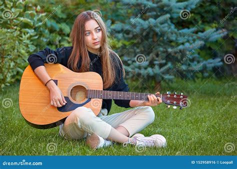 Guitarist Girl Play Music On Guitar Beautiful Singer Stock Photo