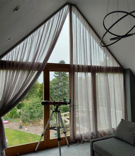 How To Hang Curtains On Apex And Angled Windows Voila Voile