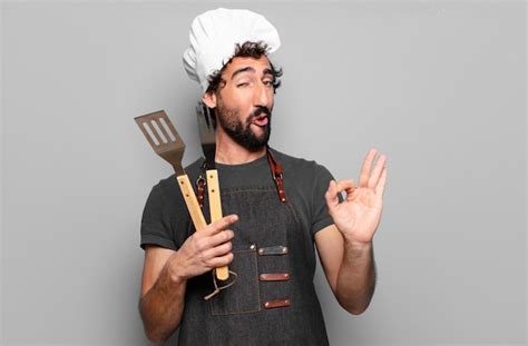 Premium Photo Young Bearded Man Barbeque Chef Concept
