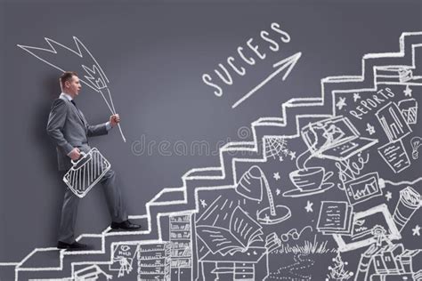 Businessman Climbing On Career Success Stairs Drawn On A Chalk Stock