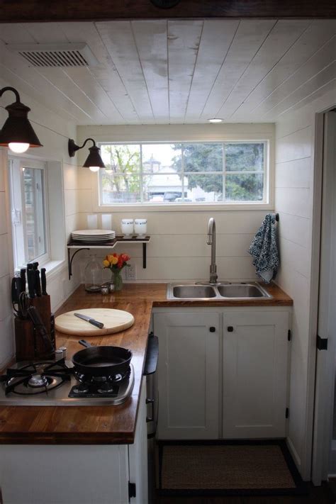 The three toe kick drawers under the kitchen's base cabinets put the space that traditionally goes to waste behind baseboards to good use. Inspiration For Your Own Tiny House With Small Kitchen Space(59) | Tiny house kitchen, Tiny ...