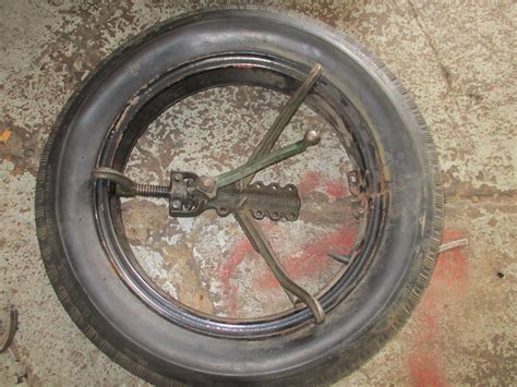 You can put the tire on the ground, put a ramp or board down with the one end on your tire close to the rim. Need split rim tire changing instruction - Chrysler ...