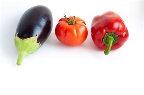 Premium Photo Vegetables Eggplant Tomato And Sweet Pepper