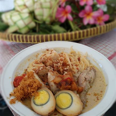 Ketupat And Opor Ayam Lebaran Dish In Indonesia