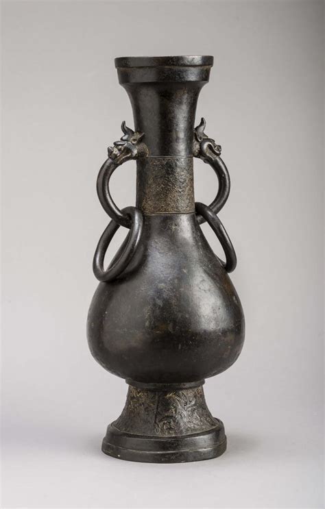 A Large Yuan Ming Dynasty Bronze Baluster Vase With Dragon