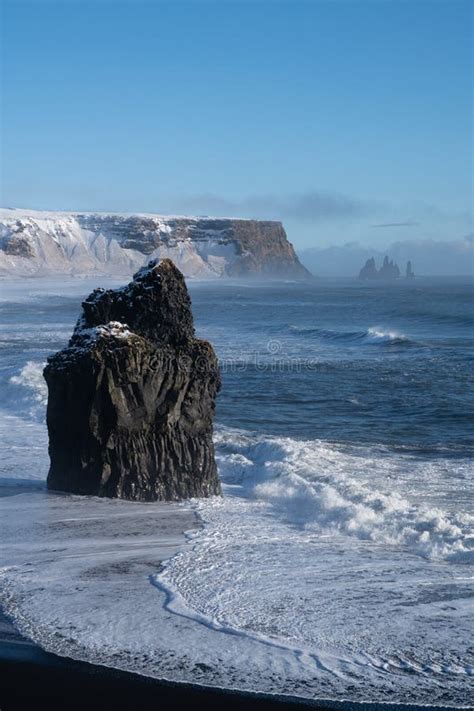 Cape Dyrholaey With Snow And Early Morning Light Winter In Iceland