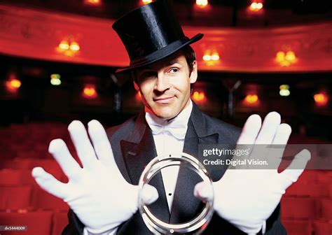 Portrait Of A Magician Performing A Magic Trick Photo Getty Images