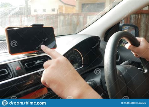 Car Driver With Smart Phone On Dashboard Stock Photo Image Of Drive