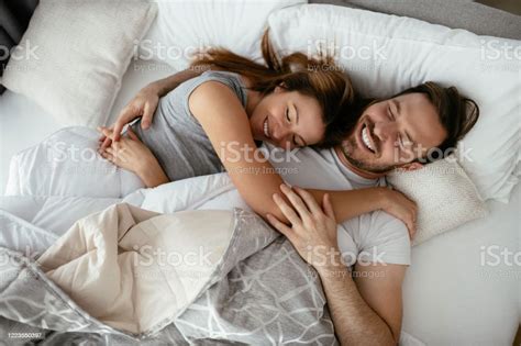 Young Loving Couple In Bed Stock Photo Download Image Now Bedtime