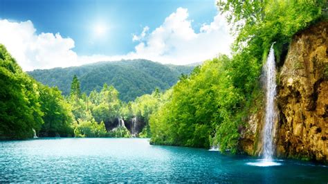 Sunny, you smiled at me and really eased the pain. Summer sunny day and wonderful waterfall in the nature