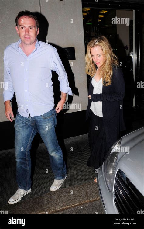 03august2010 London Gillian Anderson And Husband Clyde Klotz Stock