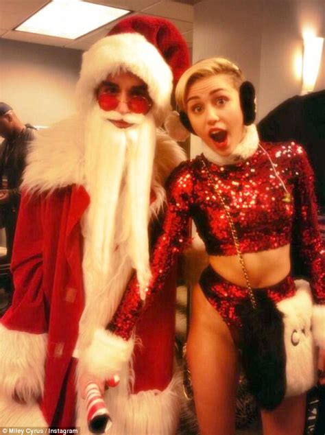 Miley Cyrus Suggestively Dances With Santa At Jingle Ball Daily Mail