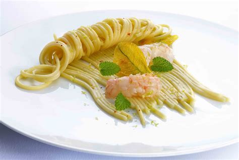 Spaghettoni Quadrati With Lemongrass Squash Blossoms And Scampi De Cecco