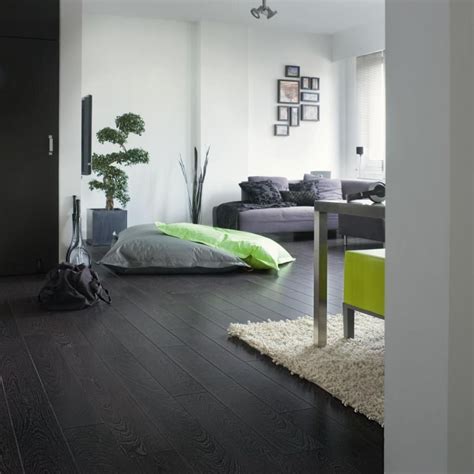 Light gray, one of the most popular neutral living room ideas , is calming and relaxing and makes a room feel open and airy, whereas dark gray is dramatic and. How to Installing Laminate Flooring | Grey laminate, Laminate flooring and Modern living rooms