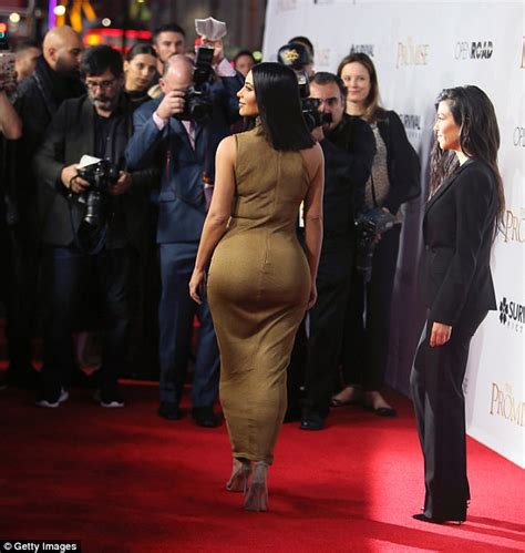 Kim Kardashian Wows In Skintight Gold Dress At Premiere Daily Mail Online