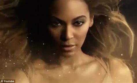 beyonce shows off her incredibly toned legs in shimmering gold one piece for new perfume advert