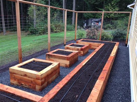 Planting on raised garden beds brings many benefits compared to planting on the ground. Enclosed Raised Bed Garden — Seattle Urban Farm Company