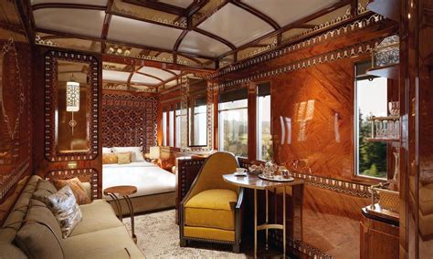 The Interior Of A Train Car That Is Decorated In Wood And Glass With